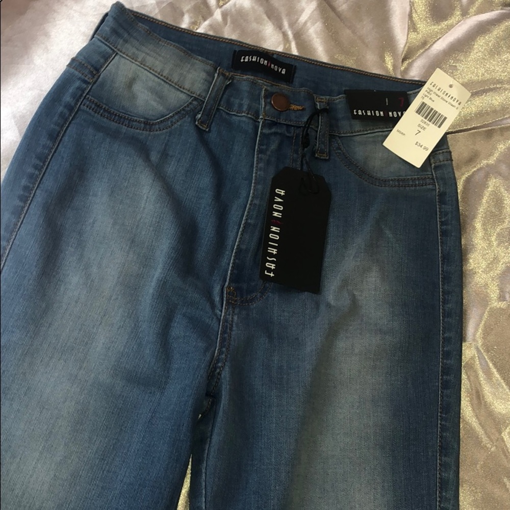 High waisted light blue jeans